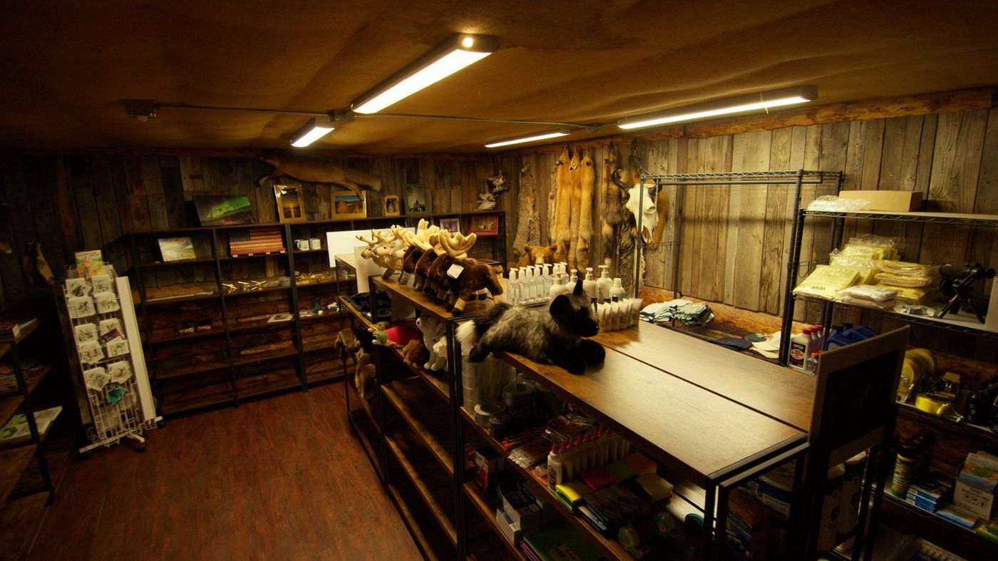 The trading post interior — souvenirs, furs, and local goods